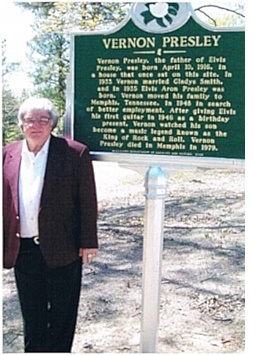Mackey with historical marker